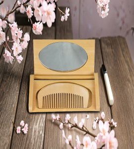 Pocket wooden miniature mirror vintage product with a wooden comb for ladies
